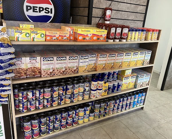 Shelves of canned beans, rice mixes and sauces